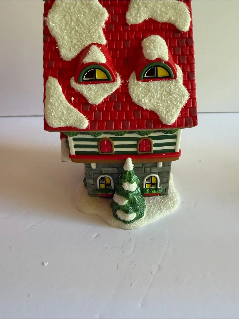 Department 56 Rudolph Hermey's Elf Dormitory - Red, Green, White, Gold